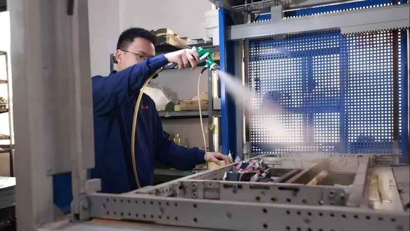 Auto-Shell-Produktions team