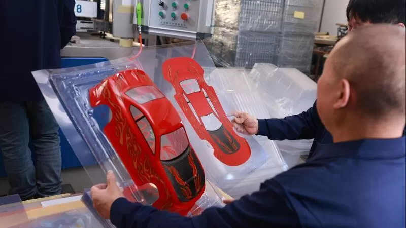 Auto-Shell-Produktions team